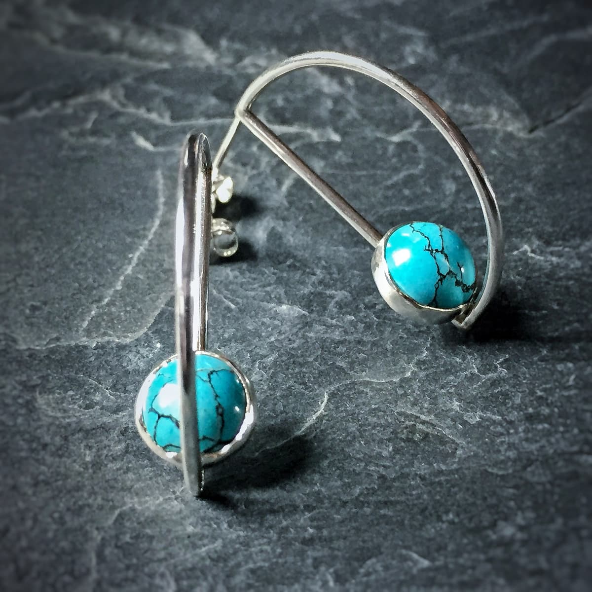 Handcrafted earrings with detailed metalwork